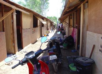 From the middle of January these wooden huts were starting to go up.  At least they offered more protection and space than the tents
