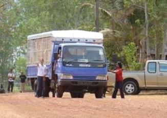 Waree directs the first load of supplies into the camp